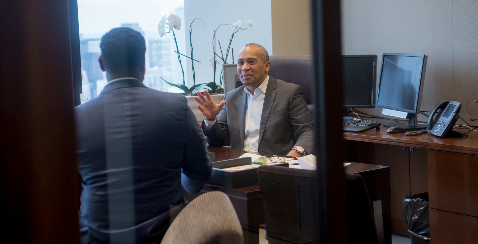 Deval Patrick and Greg Shell of Bain Capital Double Impact, at the Bain Capital Boston Office